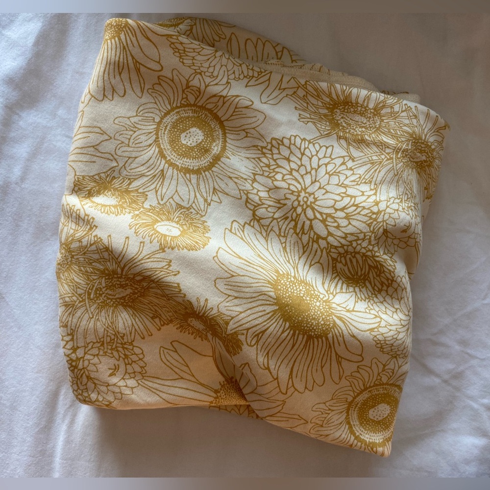 Kate Quinn sunflower swaddle